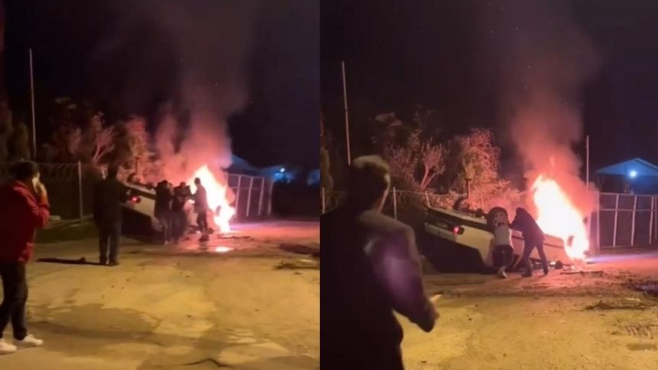 Can kurtarmak için canını tehlikeye attı, yanan araçtan sürücüyü böyle çıkarttı