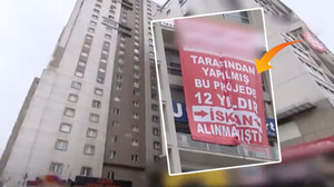 İskan problemi yılan hikayesine döndü: Site sakinleri çözümü pankartta buldu
