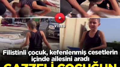 Filistinli küçük çocuk Gazze'de cesetler arasında ailesini aradı