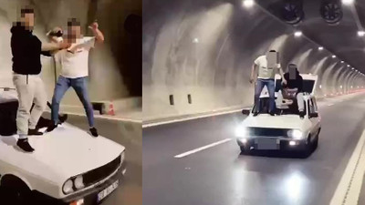 Trafik magandalığında boyut atladılar! Seyir halindeki aracın üzerine çıkıp alkolle yaptıkları akıl alır gibi değil