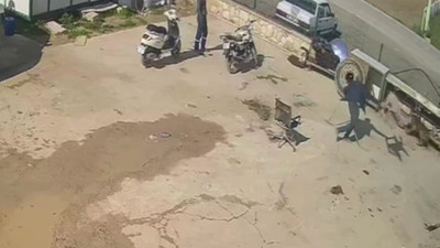Hayvan düşmanı komşu, bağlı köpeği önce hortumla sonra demirle dövdü