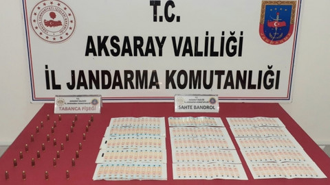 Jandarma Aksaray’da sahte içki bandrolü ve tabanca fişeği ele geçirdi