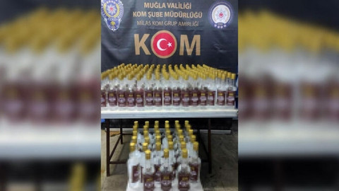 Polisin durdurduğu otomobilde litrelerce sahte alkol ele geçirildi!